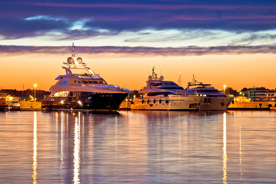 yachts in harbour at sunset